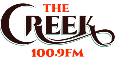 Logo with 'The Creek 100.9 FM' in stylized text.